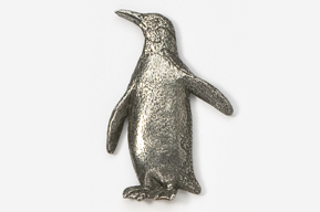 A silver penguin is standing on the ground.