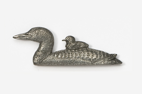 A metal duck with a baby bird on it's back.