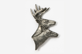 A silver deer head with long horns on top of it.