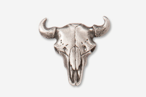 A silver bull skull with horns on top of it.