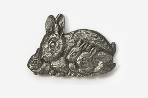 A silver rabbit with two bunnies on it.