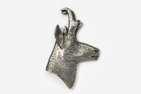 A silver animal head with horns on top of it.