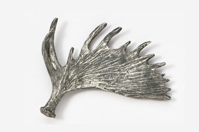 A silver object with a long, pointed tail.