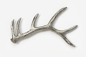 A close up of the antler on a white background