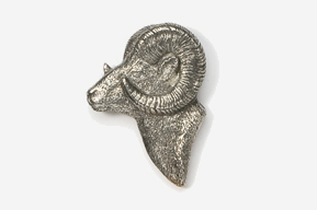 A ram head brooch in silver with the face of an animal.