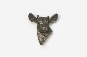 A silver cow head with horns on top of it.