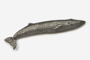 A metal object of a whale on a white background