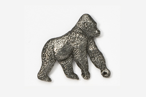 A silver gorilla is shown on the side of a wall.