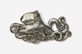 A silver octopus is shown on the side of a wall.