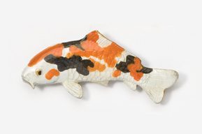 A toy fish is orange and black in color.