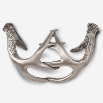 A silver deer antler brooch with the letter a