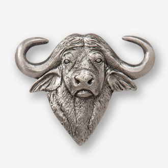 A silver buffalo head with horns on top of it.