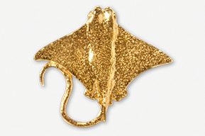 A gold colored stingray is shown in this picture.