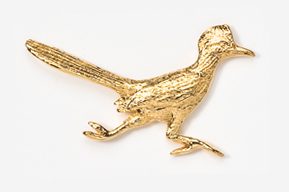 A gold bird is standing on its hind legs.