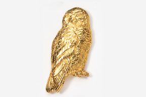 A gold owl pin is shown on a white background.