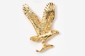 A gold eagle is flying in the air.