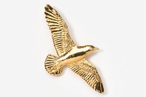 A gold bird flying in the air.