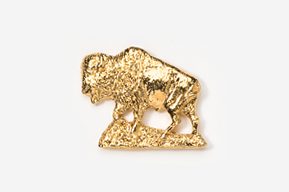 A gold buffalo is shown on the ground.