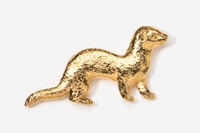 A gold animal is sitting on top of the ground.