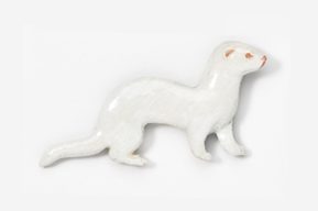 A white ferret is standing on its hind legs.