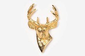 A gold deer head with antlers on top of it.