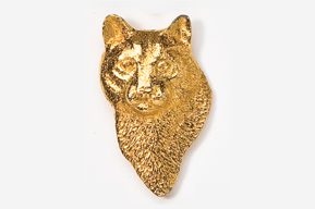 A gold colored animal head with a white background