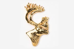 A gold moose head with antlers on top of it.