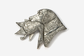 A silver dog head brooch with a bird on it's back.