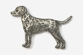 A dalmatian dog brooch is shown in this image.