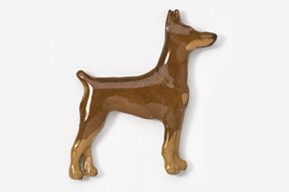 A brown dog is standing up on its hind legs.