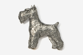 A silver dog is standing up against the wall.