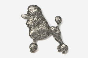 A silver poodle pin is shown here.