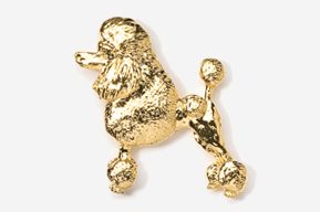 A gold poodle pin is shown in this picture.