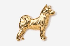 A gold dog is standing up in the air.