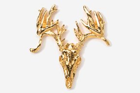 A gold deer head with antlers on top of it.