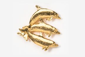 A group of three gold dolphins on top of each other.