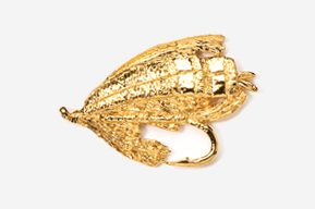 A gold leaf brooch is shown on a white background.