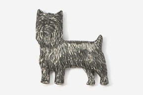 A silver dog is standing up against the wall.