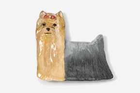 A ceramic dog dish with the head of a yorkshire terrier.