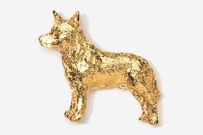 A gold dog is standing in front of the camera.