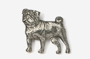 A silver dog is standing up against the wall.