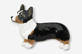 A black, brown and white dog is standing on its hind legs.