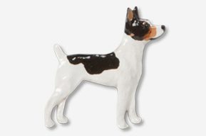 A toy dog is standing up to be painted.