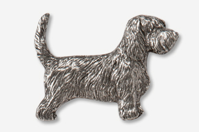 A silver dog is standing up to the side.