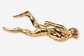 A gold statue of a person laying on its back