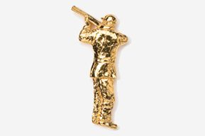 A gold plated metal figurine of a man holding a trumpet.