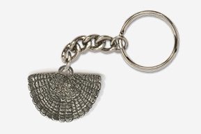 A silver key chain with a shell on it.