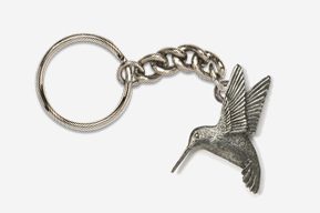 A silver key chain with a hummingbird on it.