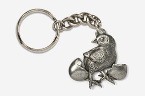 A silver key chain with a bird on it.