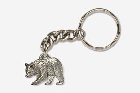 A bear keychain is shown in silver.